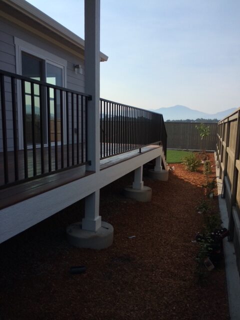 Black iron rod fence on deck